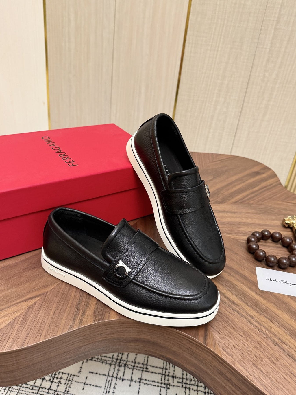 Salvatore Ferragamo Black Loafers with White Soles — front