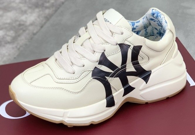 Gucci Cream Chunky Sneakers with Black Accents — hero