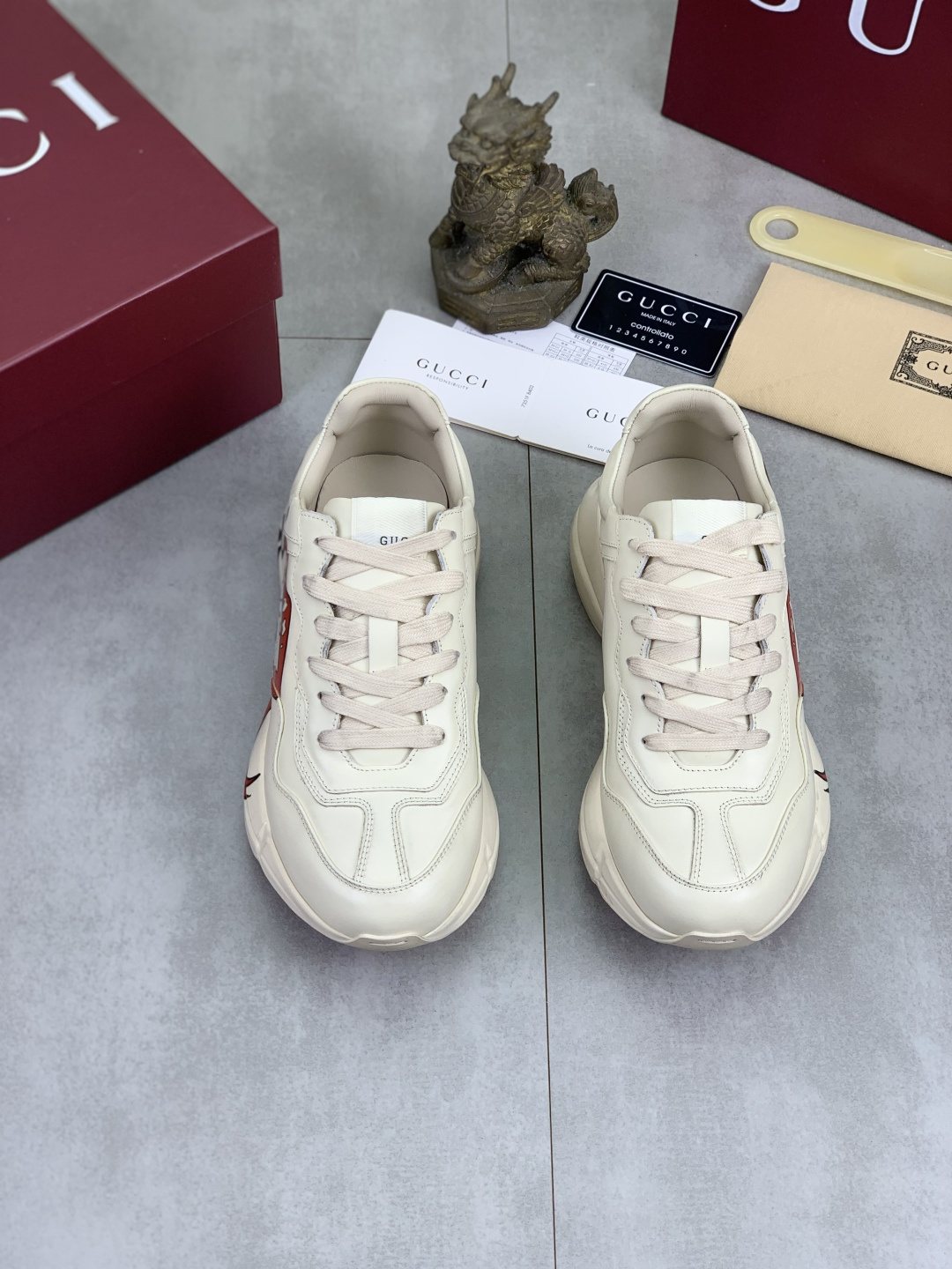 Gucci Cream White Graphic Chunky Sneakers — front