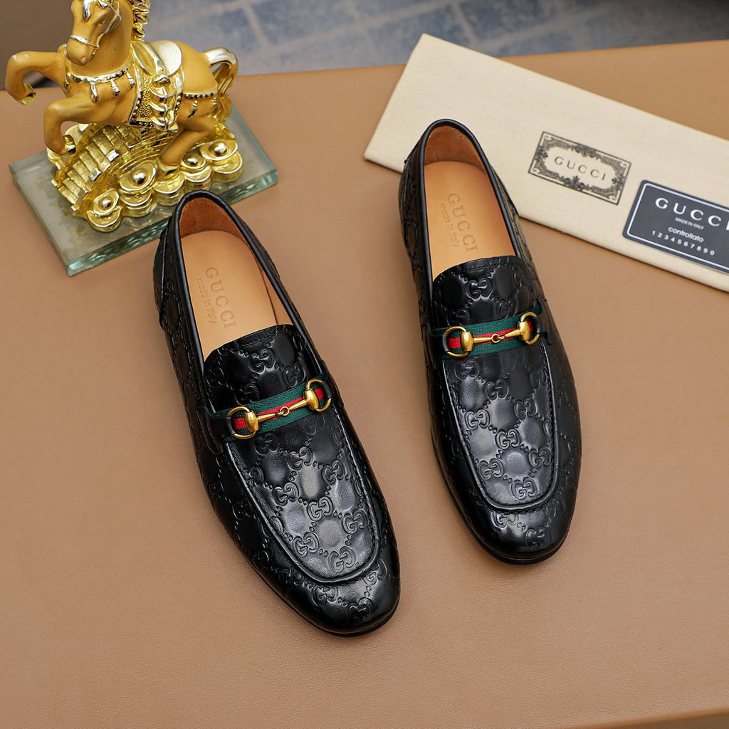 Gucci Patterned Metal-Bit Loafers — front