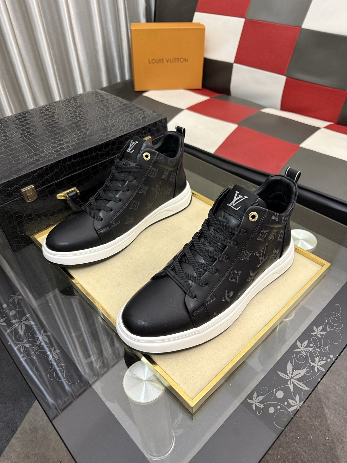 Louis Vuitton Embossed High-Top Sneakers — front