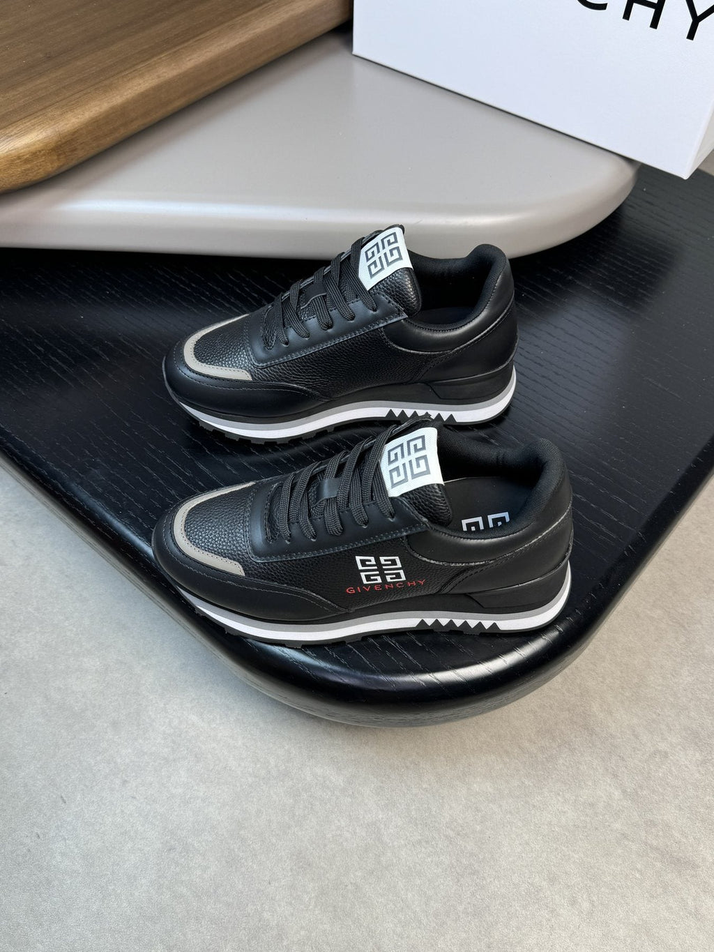 Givenchy Paneled Low-Top Sneakers — model