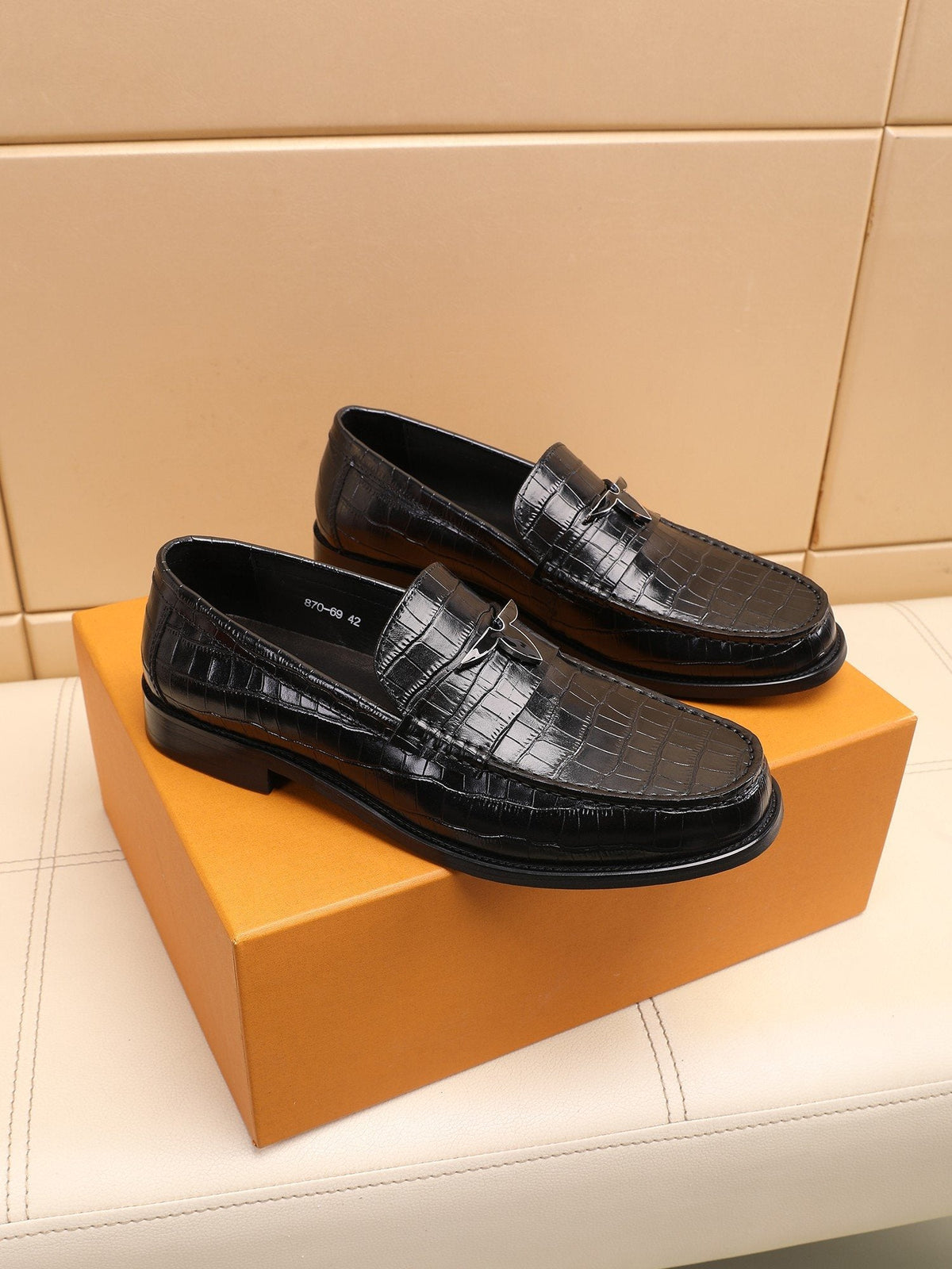 Louis Vuitton Embossed Strap Loafers — hero